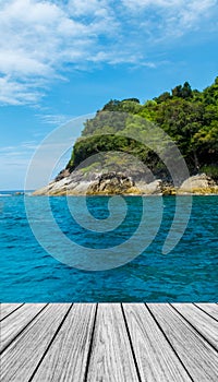 Wood Terrace on The Beach with Clear Sky,Blue Sea and Island