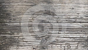 Wood texture background. Top view of vintage wooden table with cracks. Light grey surface of old wood with natural color.