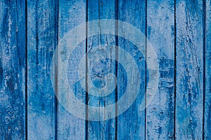 Wood texture. Blue background old pale scratched panels