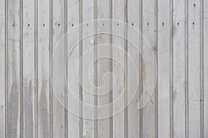 Wood texture. Fence from gray wooden planks.