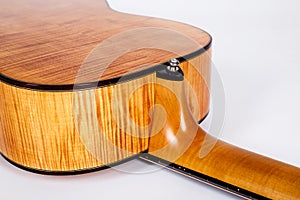 Wood texture of lower deck of six strings acoustic guitar on white background. guitar shape