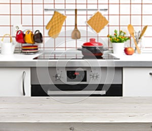 Wood texture table on defocused kitchen bench background