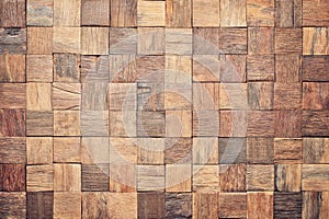 Wood texture wall panel made of small planks. brown planks as background