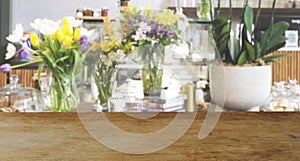 Wood  top table Blur coffee shop or cafe restaurant with abstract bokeh light image background.
