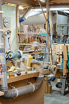 Wood work shop with dust and shavings, tools and machinery
