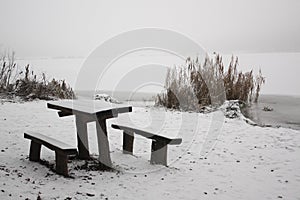 Woodbench on the lakeshore
