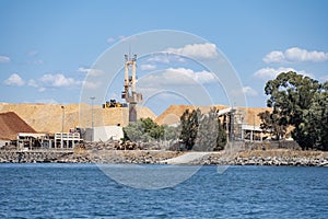 Woodchip piles at Bunbury Port, WA.