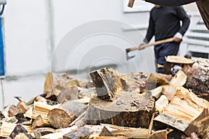 Woodcutters who break wood with an axe