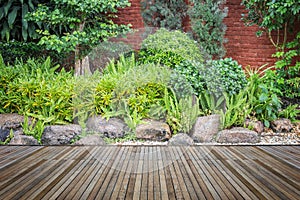 Woodecking or flooring and plant in garden decorative