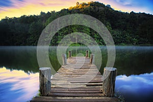 Wooded bridge over the river in Pang ung park