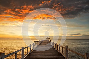 Wooded bridge with sunset