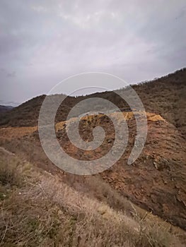 A wooded vally and road in the Highlands of near Kocani,