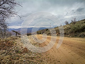 A wooded vally and road in the Highlands of near Kocani,