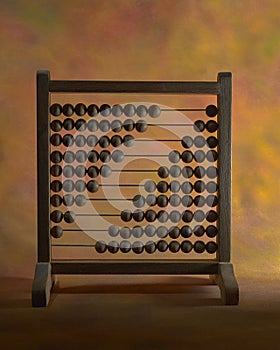 Wooden Abacus With wooden Beads Isolated on Dark Background. Navi Mumbai