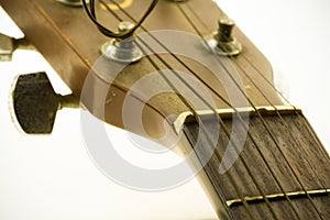 Wooden acoustic guitar bar. detail of classic guitar