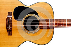 Wooden acoustic guitar isolated closeup
