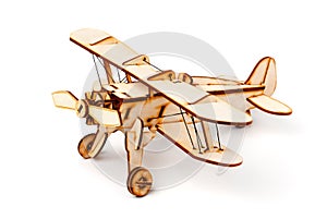 Wooden airplane model on white background