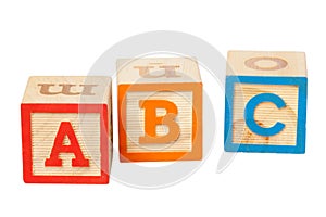 Wooden alphabet blocks isolated on white background