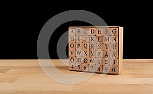 Wooden alphabet blocks, Scandinavian Alphabet wooden Cubes isolated.