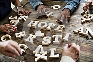 A wooden alphabet hope word on the table