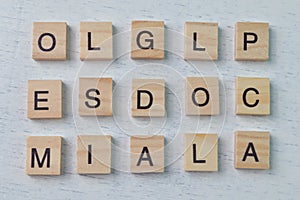 Wooden alphabet letters isolated on a white background