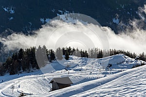 Wooden alpine hut in ski resort Serfaus Fiss Ladis in Austria wi