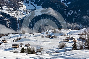 Wooden alpine huts in ski resort Serfaus Fiss Ladis in Austria w