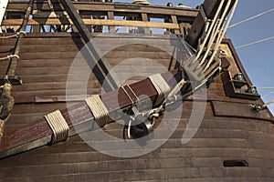 Wooden anchor of old pirate ship close up shot at sunny day