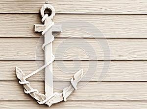 Wooden anchor on wall vintage background