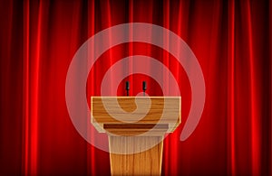 Wooden announcement podium with microphone.