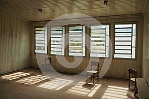 Wooden antique chair and sunlight in a room