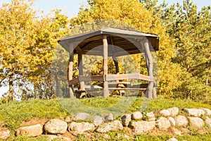 Wooden arbour on the hill