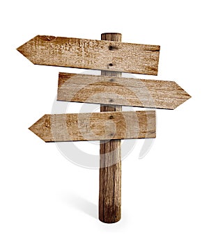 Wooden arrow sign post or road signpost isolated