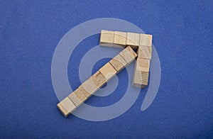 Wooden arrow upwards created as a business concept