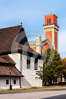 Wooden articular and New red church in Kezmarok, Slovakia photo