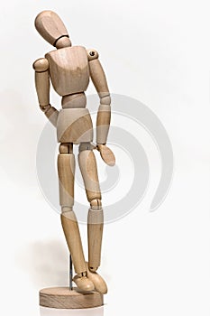 A wooden articulated mannequin as an aid in drawing