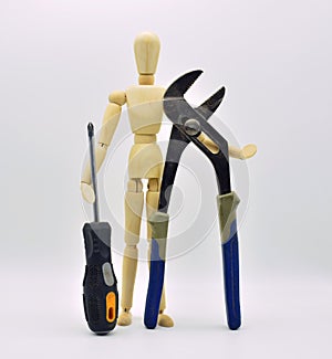 Wooden articulated mannequin with work photo
