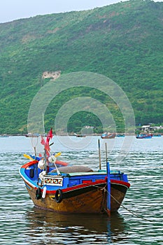 Wooden Asian boat in the port