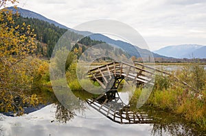 Wooden autumn bridge photo