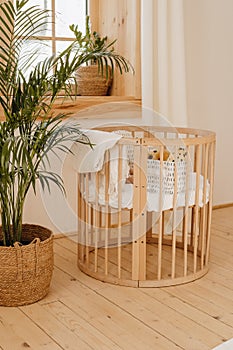 Wooden Baby Bed Crib in Eco Friendly Cozy Interior