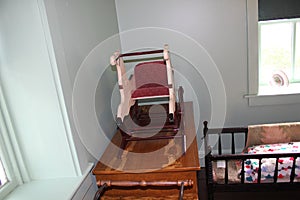 Wooden baby furniture and cradle inside Amish house