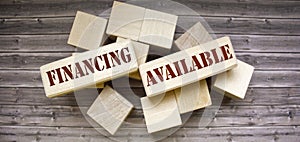 wooden background blocks with the text Financing Available