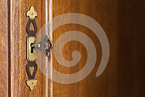 Wooden background with doorplate and key photo