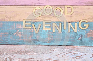 wooden background with good evening write
