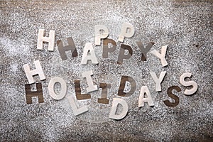 Wooden Background Happy Holidays Written With Cookie Dough