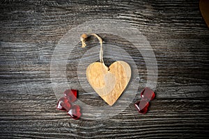 Wooden background with hearts for Valentine`s day. Red and white hearts
