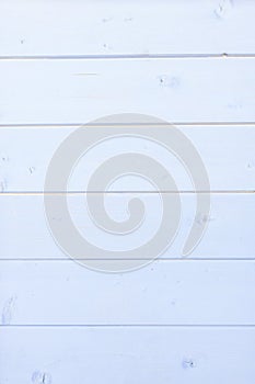 A wooden background painted with gray-brown paint, vertical slats. Wooden texture