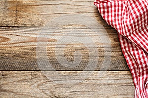 Wooden background with red and white textile