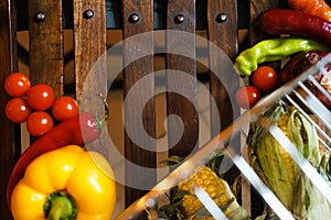 Wooden background with vegetables