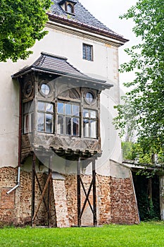 wooden balcony, Palace in Dabrowa Niemodlinska near Opole, erected in 1615–1617, historic castle building, Poland